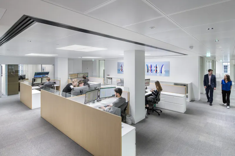 Predictable quiet zone with planted screens and softer lighting at Cantillon Capital Management London by K2 Space