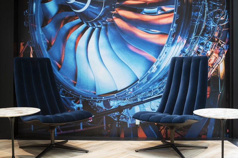 Rolls-Royce London office reception Premium brand reception with full-height graphics in characterful office