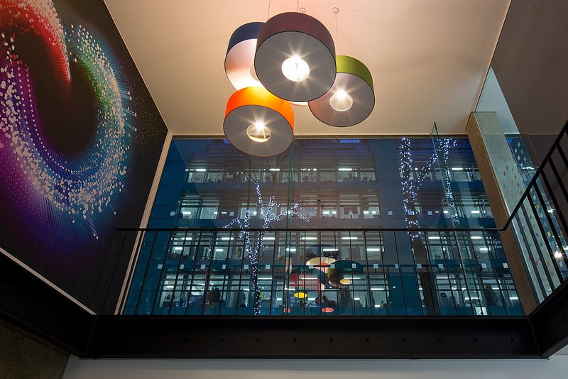 Creative-lighting-fixtures-in-vibrant-office-setting-Adobe