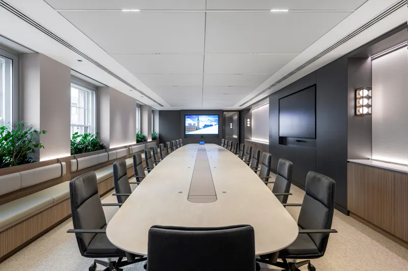 Custom 9.2-metre Corian boardroom table with leather inlay at a Mayfair Private Investment Firm by K2 Space