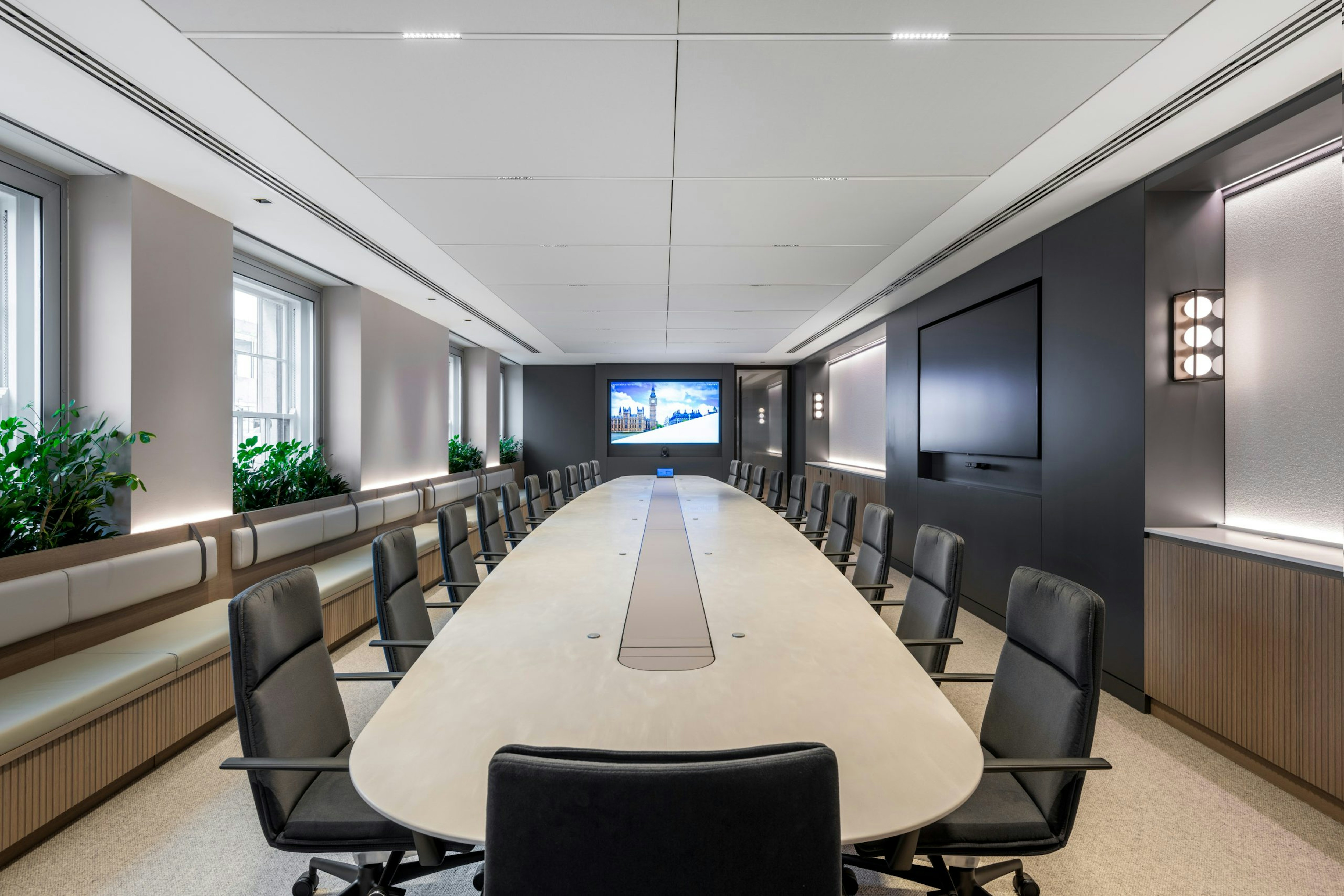 Global Private Investment Firm - Boardroom with 9.2 metre Corian table and leather inlay. - Large