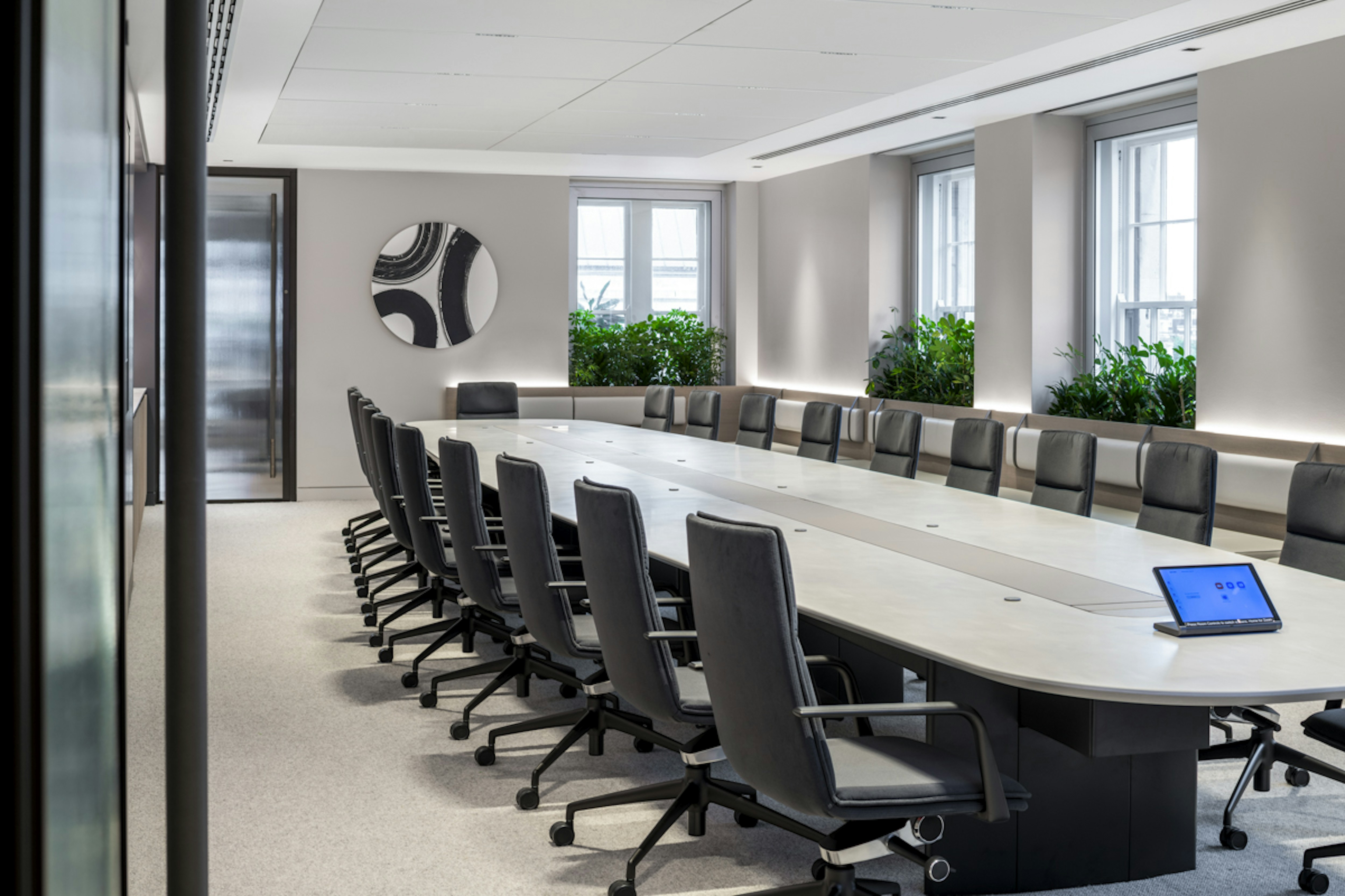 Global Private Investment Firm - Close-up of round black and white wall art in the boardroom - SMALL-5