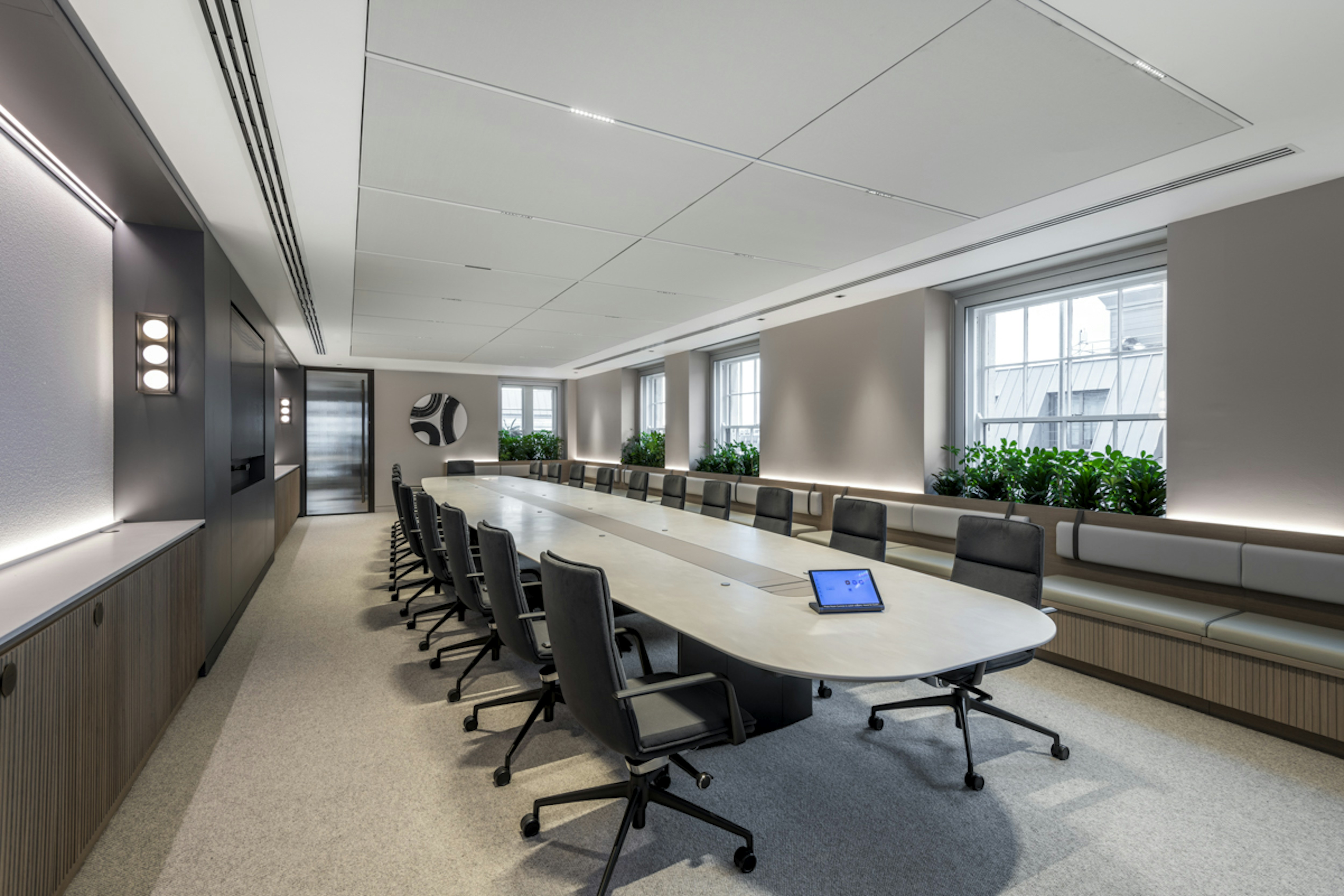 Global Private Investment Firm - Side view of Corian boardroom table with ergonomic chairs - SMALL-3