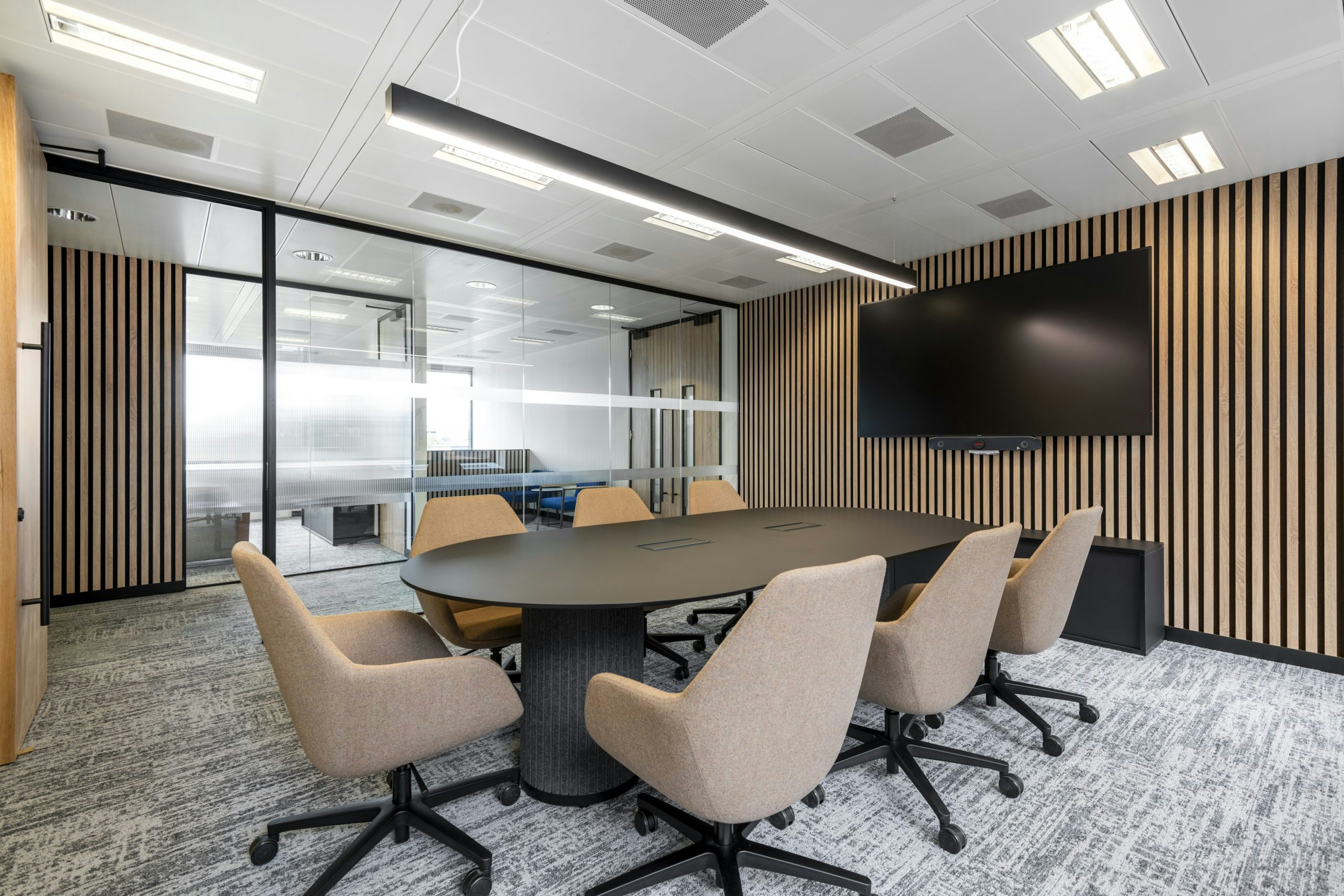 IMSO Meeting Room with Modern Aesthetic and Wood Paneling