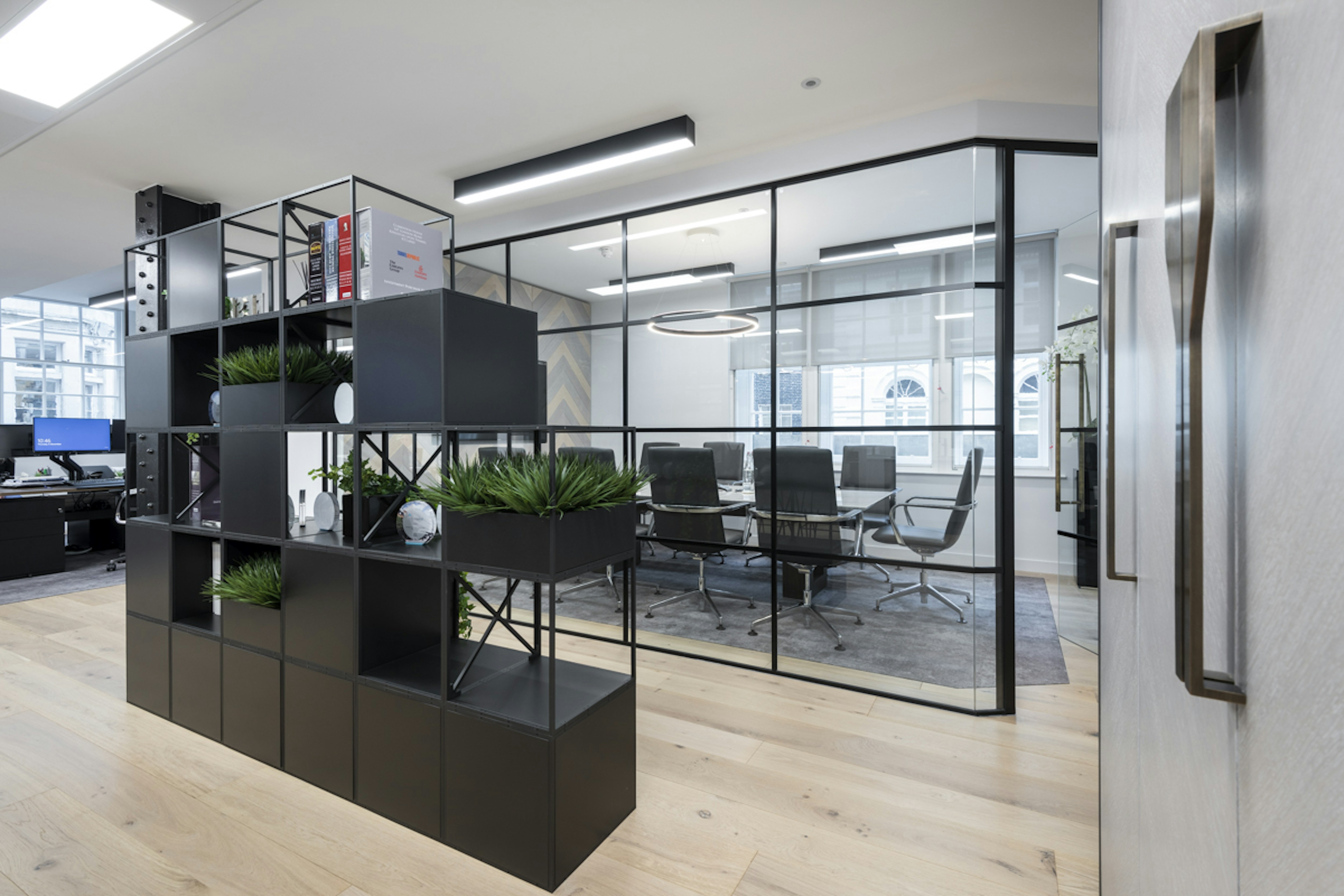 Altum Capital - Stylish Black Modular Shelving with Greenery Divider