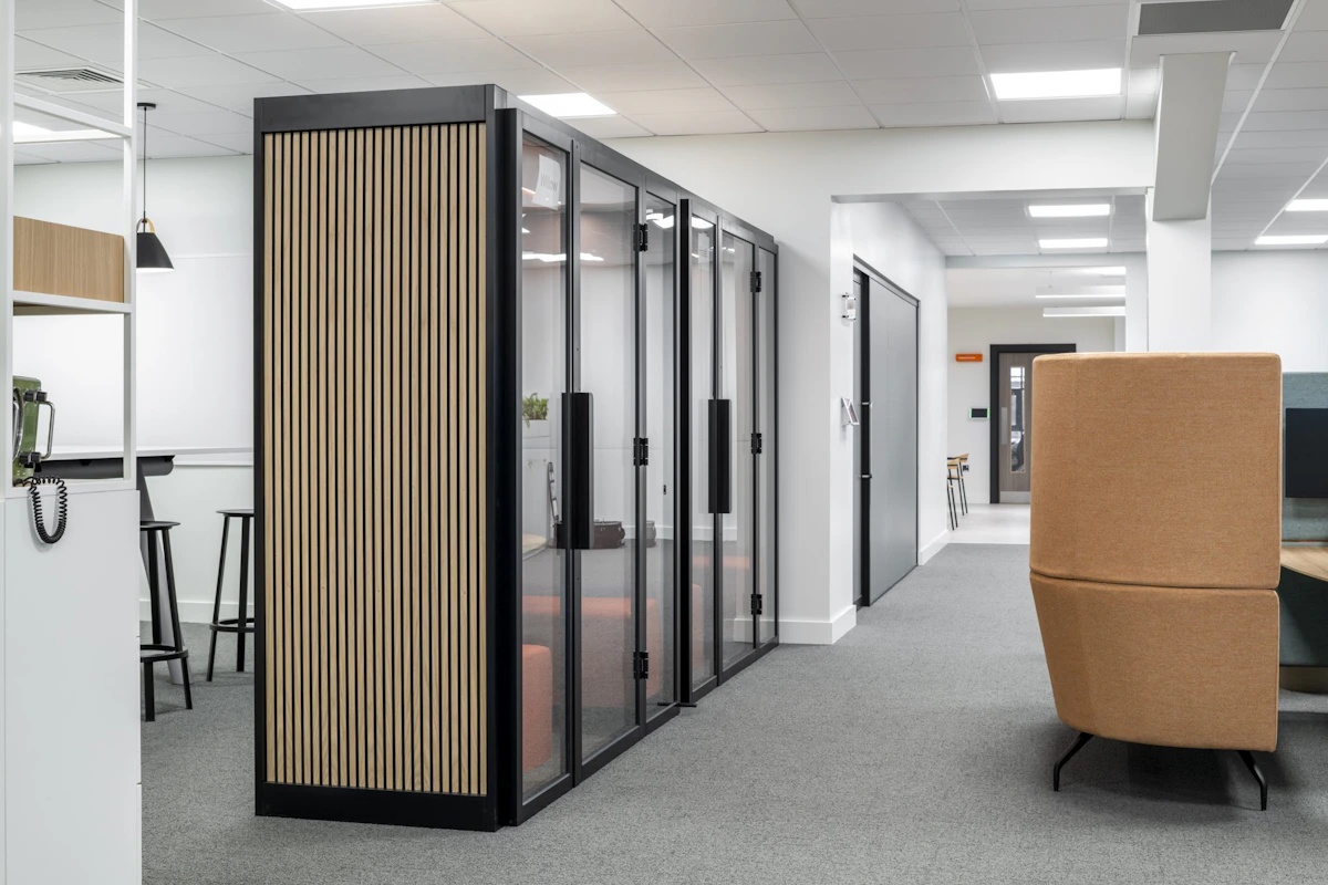 Quiet library-style focus area at Oil Spill Response (OSRL) designed for deep concentration work by K2 Space
