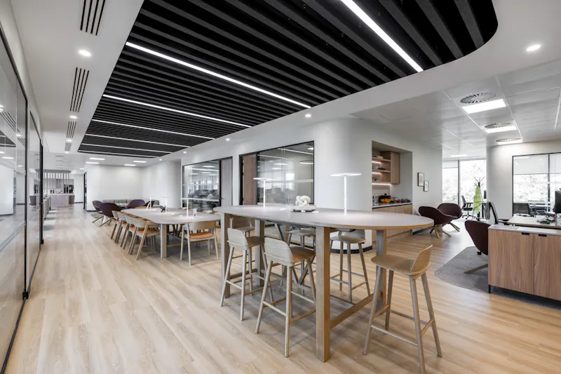 Generous circulation route designed for movement and incidental interaction at the Global Innovation Institute by K2 Space