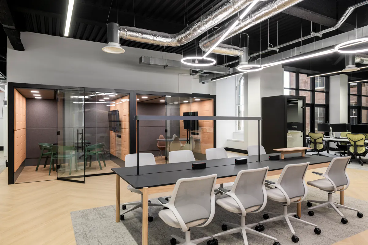 Activity-based hybrid workspace with a mix of desks, collaboration zones and informal seating designed by K2 Space