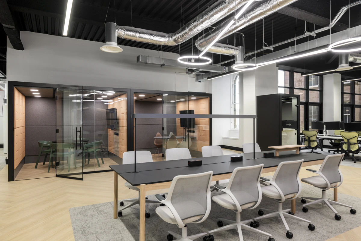Activity-based hybrid workspace with a mix of desks, collaboration zones and informal seating designed by K2 Space