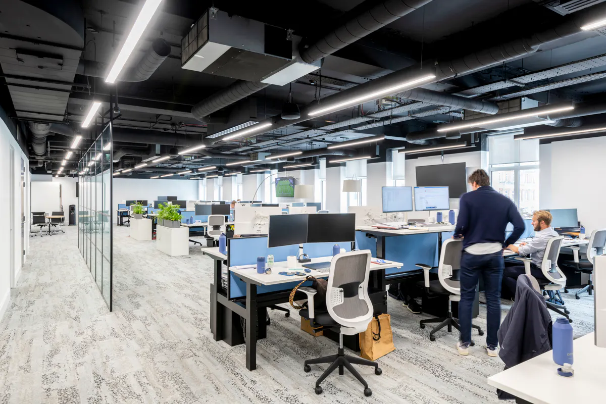Touchdown bench seating and hot desking area for short-stay working between meetings by K2 Space