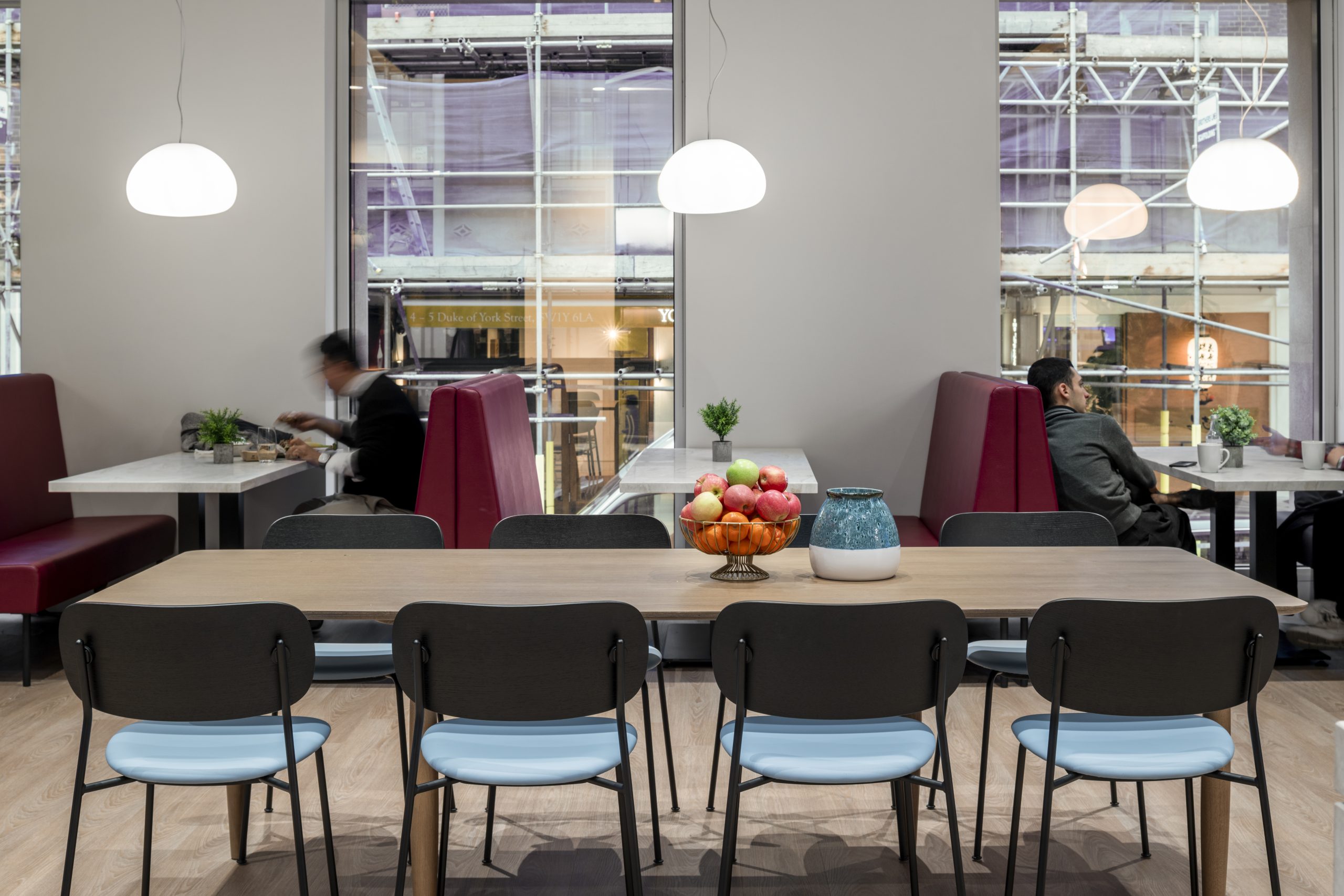 Private meeting room with acoustic glazing for confidential discussions Enclosed meeting room in a London professional services office designed for confidentiality