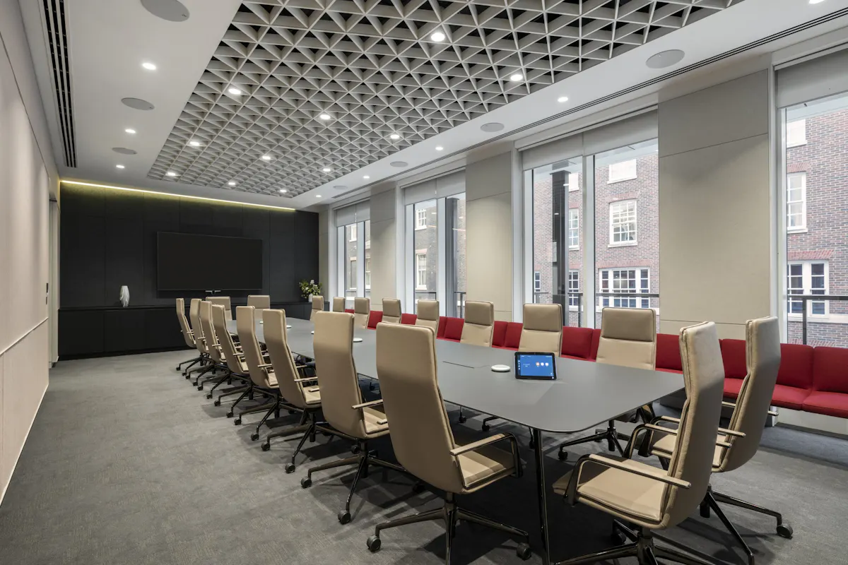 AV-equipped meeting room with conferencing technology supporting meeting equity for hybrid teams by K2 Space