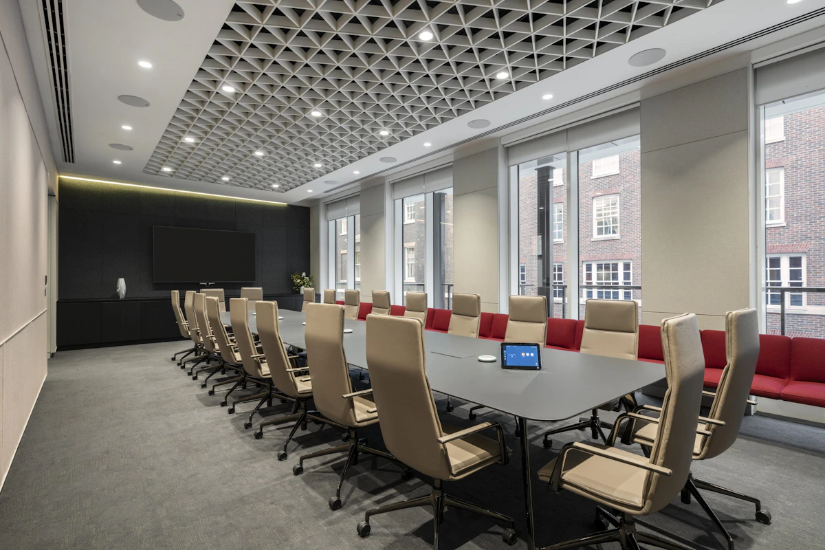 AV-equipped meeting room with conferencing technology supporting meeting equity for hybrid teams by K2 Space